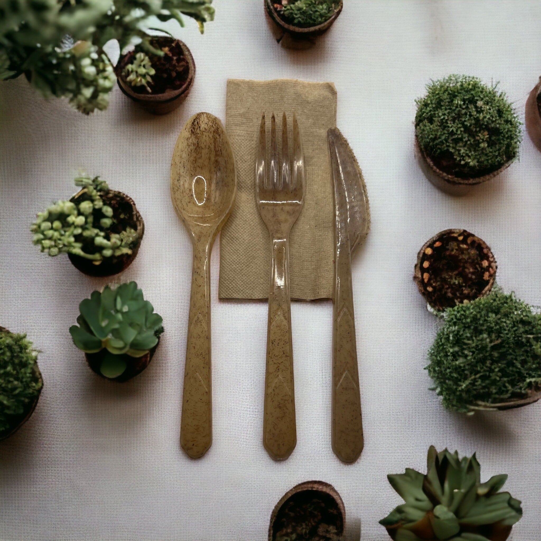 Avolutions natural cutlery arranged in an elegant table setting